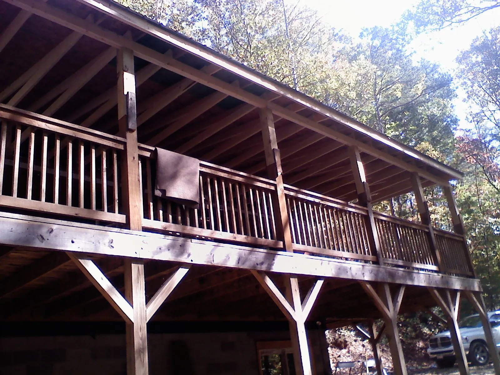 Timber framing under a new elevated porch and deck — Roof Leak Repair in Duff by Roofing Brothers